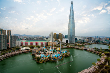 Cityscape of Seoul downtown city skyline with cherry blossom