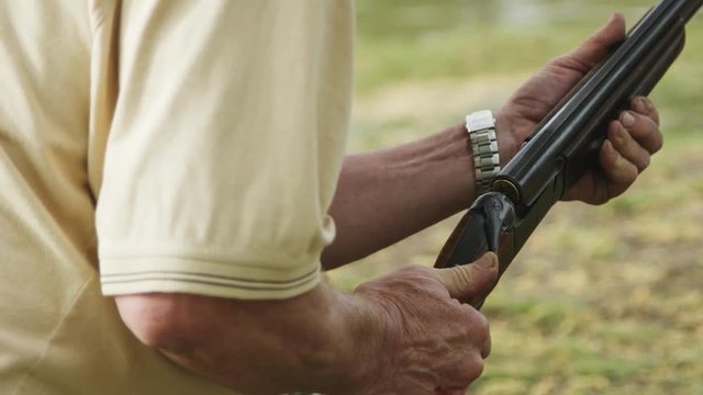 Man makes a shot from hunting rifle liner effectively fly away with smoke