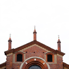 Fototapeta na wymiar Ancient red brick church in Milano. Old architecture