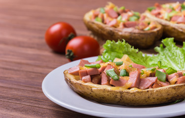 Baked potato with sausage