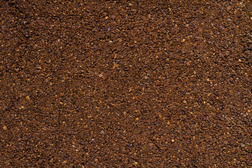 Background from ground coffee. Closeup