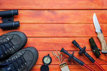 Flat lay image of  plan travel.Background concept.Items for traveler and backpacker adult or teenage to holidays trip.Items for hiking and travel to mountains.Space for creative design.