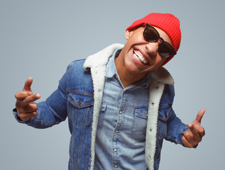 Expressive bully black man on gray