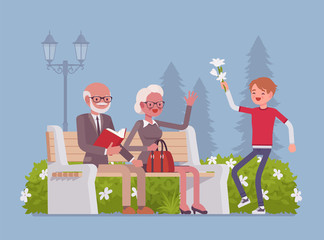 Grandparents and grandson in park