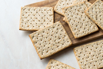 Stack of Honey Flavored Graham Crackers on Wooden Surface.