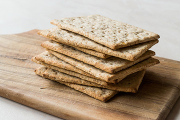 Stack of Honey Flavored Graham Crackers on Wooden Surface.