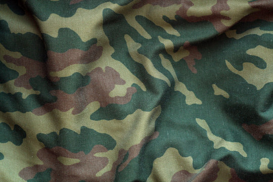 Military uniform pattern with blur effect.