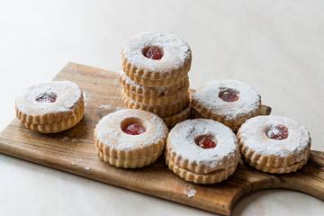 Jam Filled Round Linzer Cookies with Powder Sugar