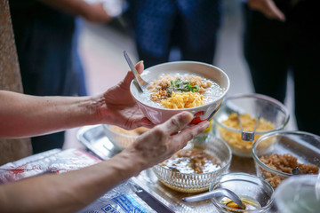 The boiled rice is a popular delicious breakfast in Thailand.