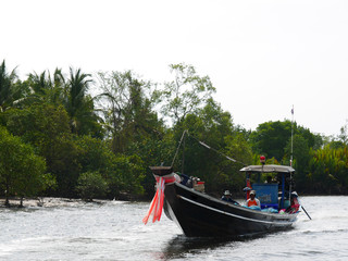 Thai fisherman boat in the river before out to the sea