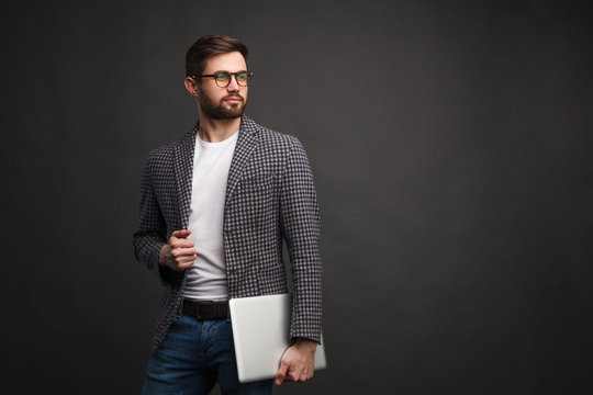 Elegant Confident Man With Laptop