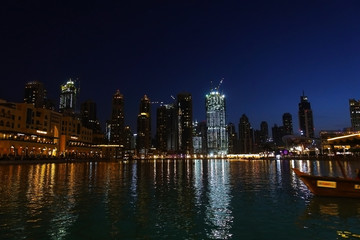 Fototapeta na wymiar Dubai downtown night scene landscape, famous place to visit, UAE 