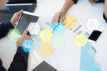 Colored applications icons and graphs on virtual screen. Business, internet and technology concept.