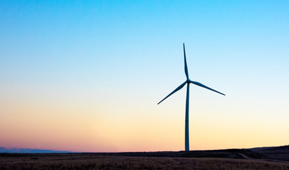 Single wind Turbine at sunrise