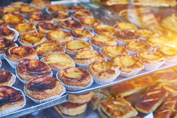 Traditional Portuguese dessert, pastel de nata on a tray