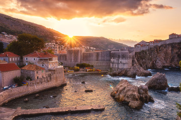 Old city of Dubrovnik at sunrise, amazing view of the ancient city wall and fort Bokar from fortress Lovrijenac. The world famous and most visited historic city of Croatia, UNESCO World Heritage site