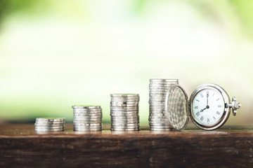 Money growth coin silver and young hand White background
