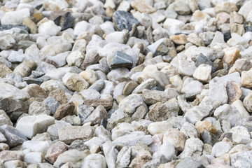 Stones of gravel in daylight.