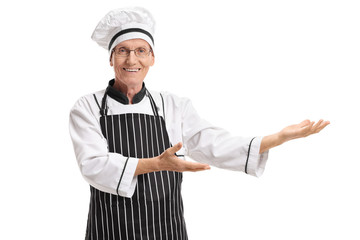 Elderly chef gesturing with his hands