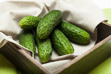 Green cucumber basket background, bowl.