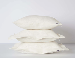 White throw pillows isolated on white