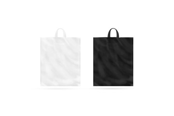 Blank black and white plastic bag with handle mockup isolated, front view, 3d rendering. Empty...