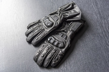  Motorcycle gloves on a gray background