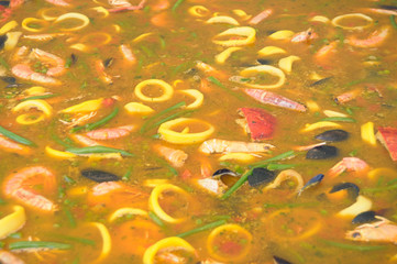 Preparation of a gigantic paella with seafood 059