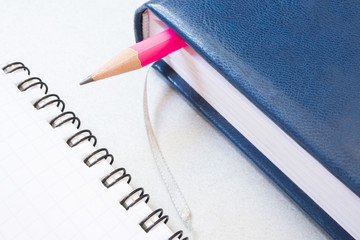 Notepad and simple pencil, macro photo, business concept, work. close up