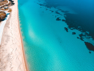 Fototapeta na wymiar Aerial view of azure sea with beach