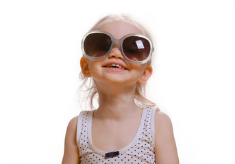 Portrait of cute caucasian baby 2-3 year old with big sunglasses on face. Isolated on white background