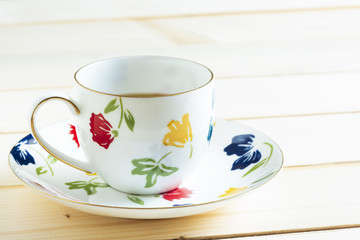 A cup of tea on wooden background