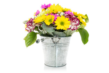 Bouquet from various flowers in a metal bucket © graja