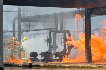 Fire fighters battling a blaze at oil pipeline refinery 