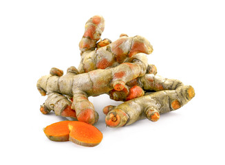 Cutting of turmeric roots isolated on white background