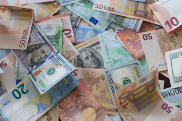 dollar and euro banknotes