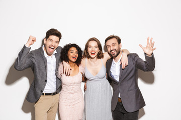 Group of joyful well dressed multiracial people