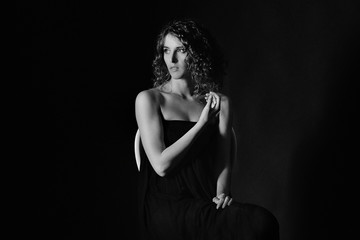 Naklejka premium female portrait in a dark hall,