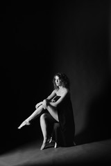 female portrait in a dark hall,