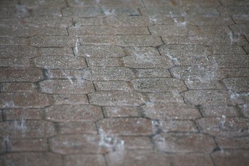 Raindrops Splattering on Cobblestone Tiled Driveway at Security Guard Gatehouse to Gated Community...