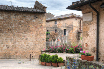 Fototapeta na wymiar Magic streets of a medieval town in Tuscany, Monticchiello.