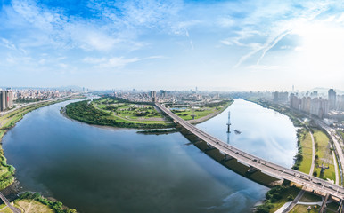 Taipei City Aerial View - May 6, 2018:Asia business concept image, panoramic modern cityscape building bird&rsquo;s eye view under sunrise and morning blue bright sky, shot in Taipei, Taiwan.