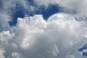 Fluffy Billowy Cumulus Clouds in the Blue Summer Sky in Florida