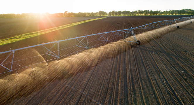 Center pivot irrigation system on field