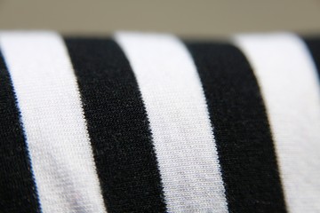Macro Closeup of Black and White Striped Fabric on Seat Cushion Outdoors