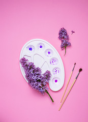 Lilac and artists palette with violet paint