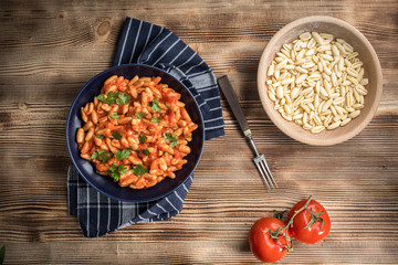 Cavatelli pasta with fresh tomato sauce.