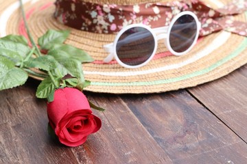 straw hat and sunglasses