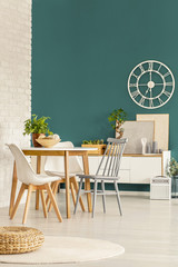 Green and gold dining room