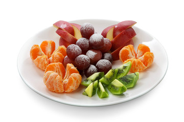 Platter of various fruits isolated on white background